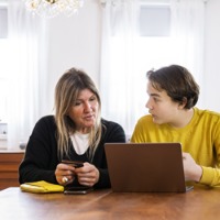 Mom teaches son about money