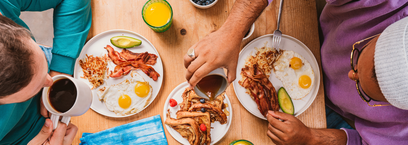 overhead shot of two people eating breakfast