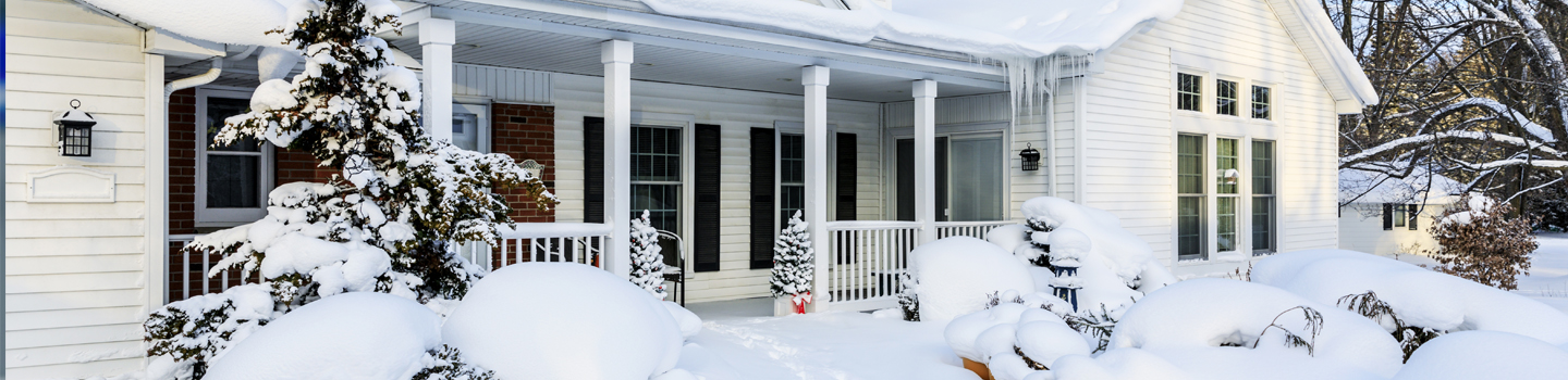 A home in the winter with snow