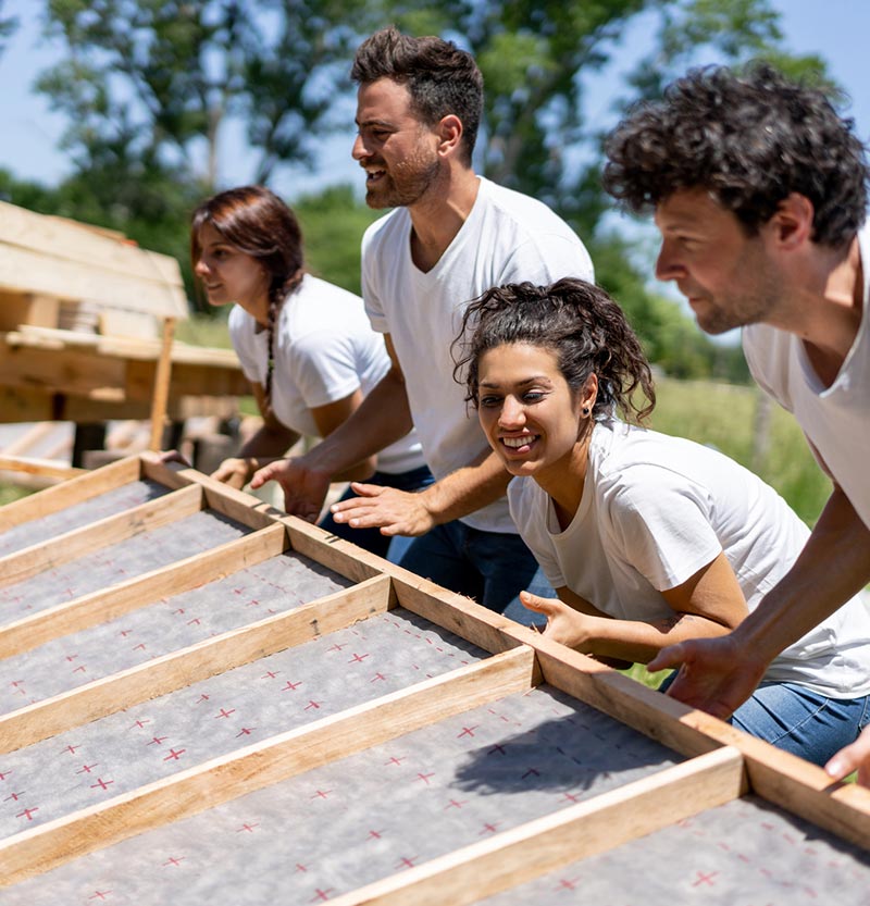 People building a house