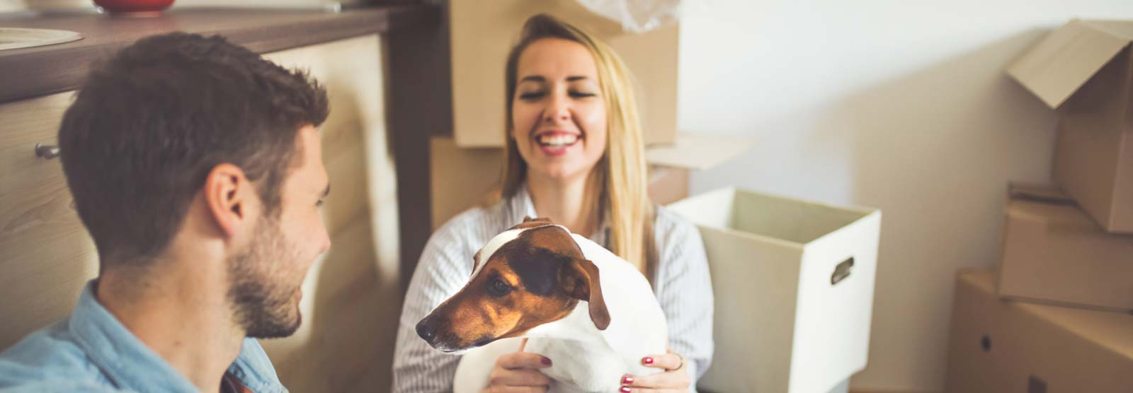 Couple in a new home with a dog