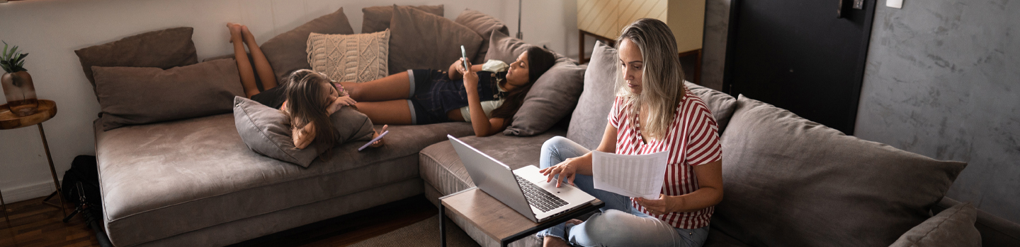 Mom with daughters on couch