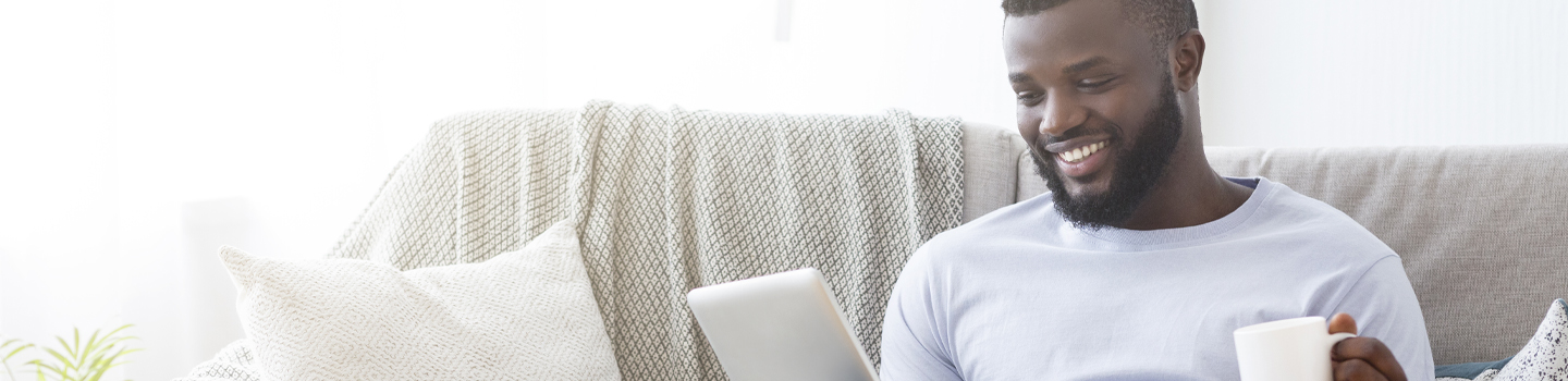 Man reading story on tablet