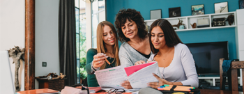 mom and daughters discussing college financials